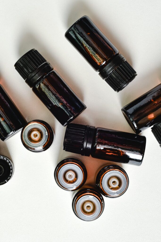 essential oil bottles on a white surface